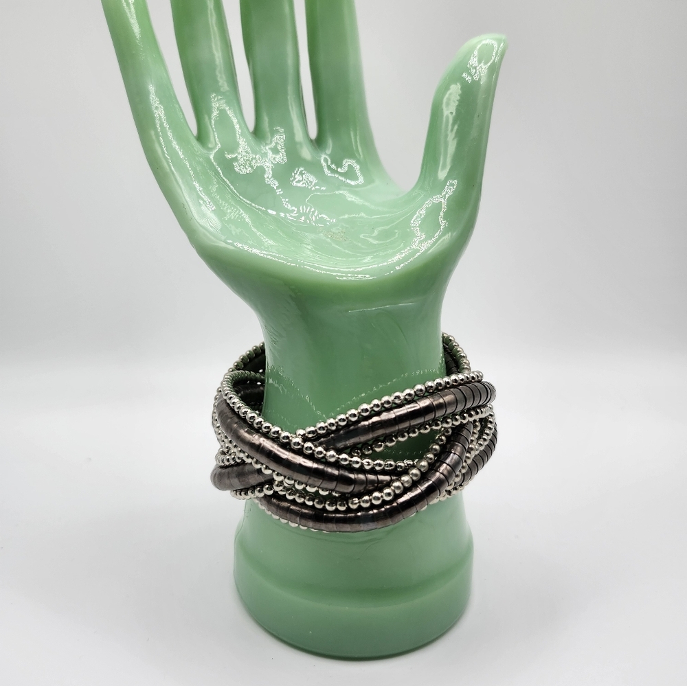 Well made boho snake like wired knot bracelet.   Silver & copper/brown tones.